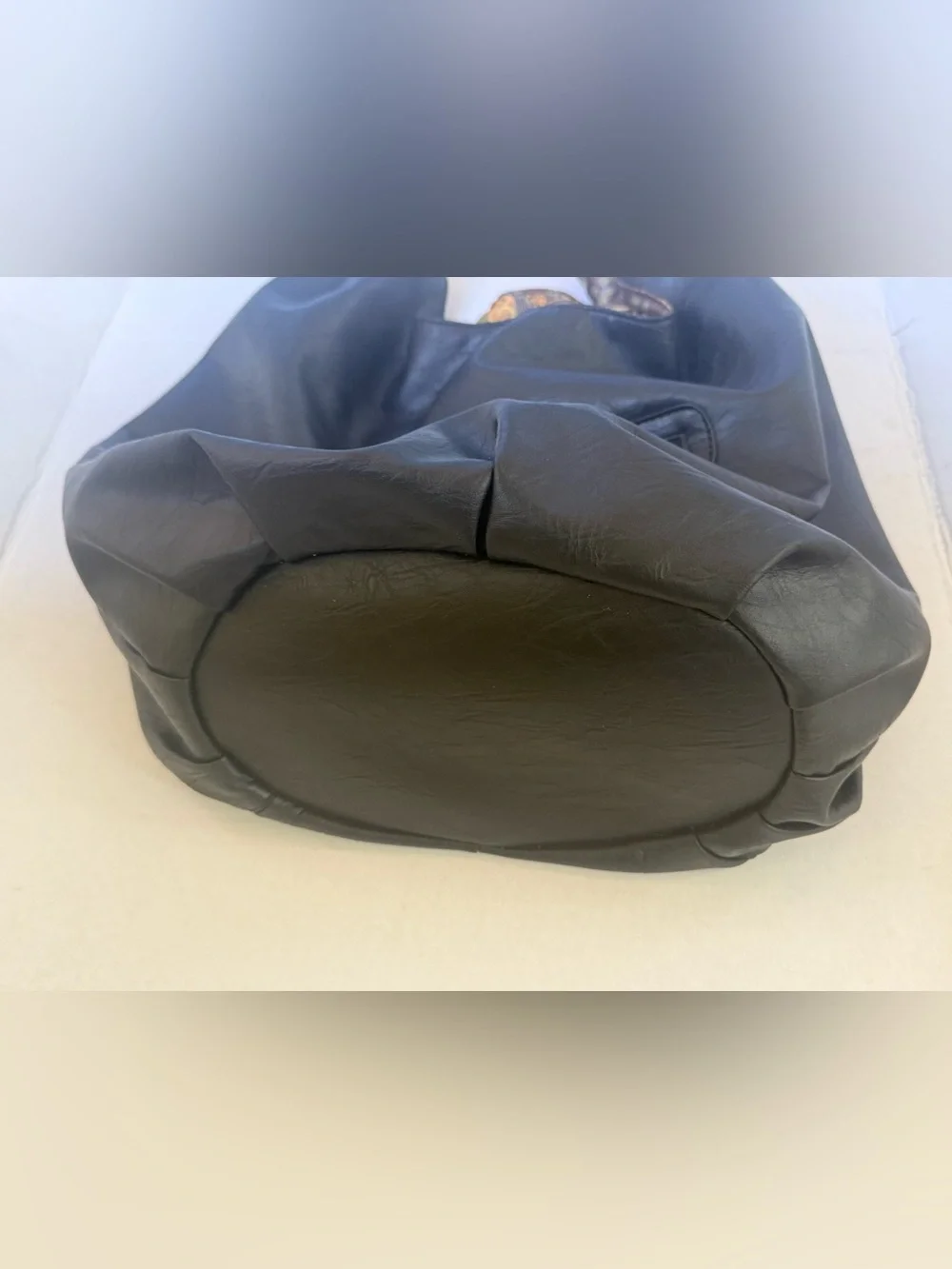 Black Leather Hobo Bag with Patterned Trim